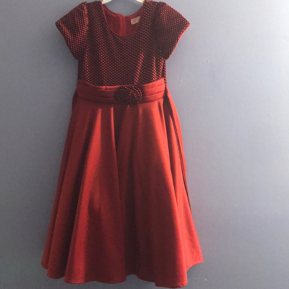 Girl’s dark red dress